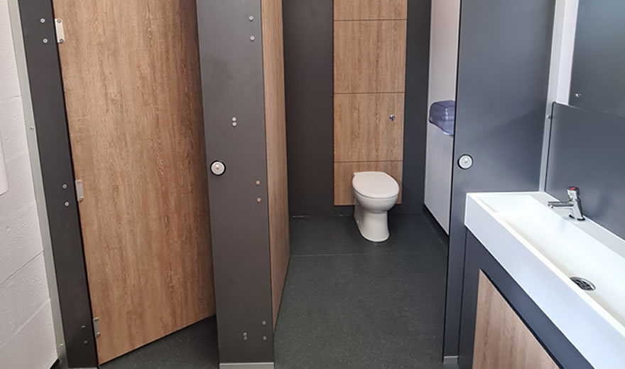 Commercial toilets installed by Skobex Washrooms